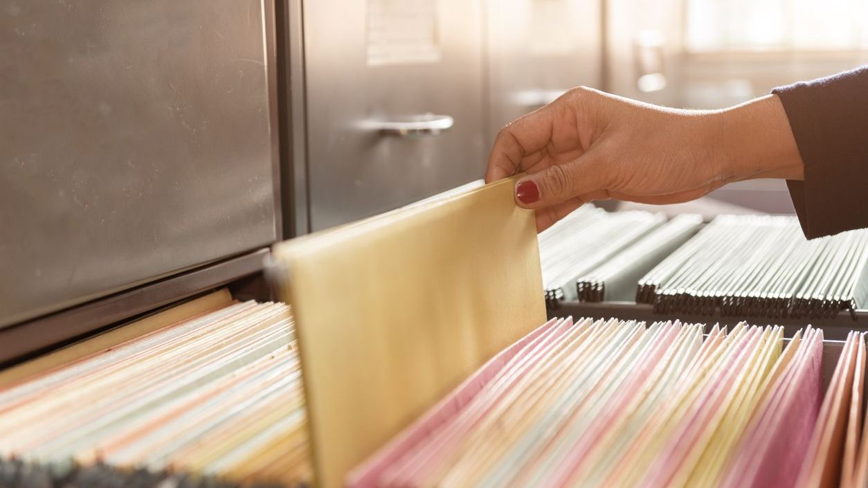 Earlier Outbreaks on International Cruise Ships Person selecting a file.
