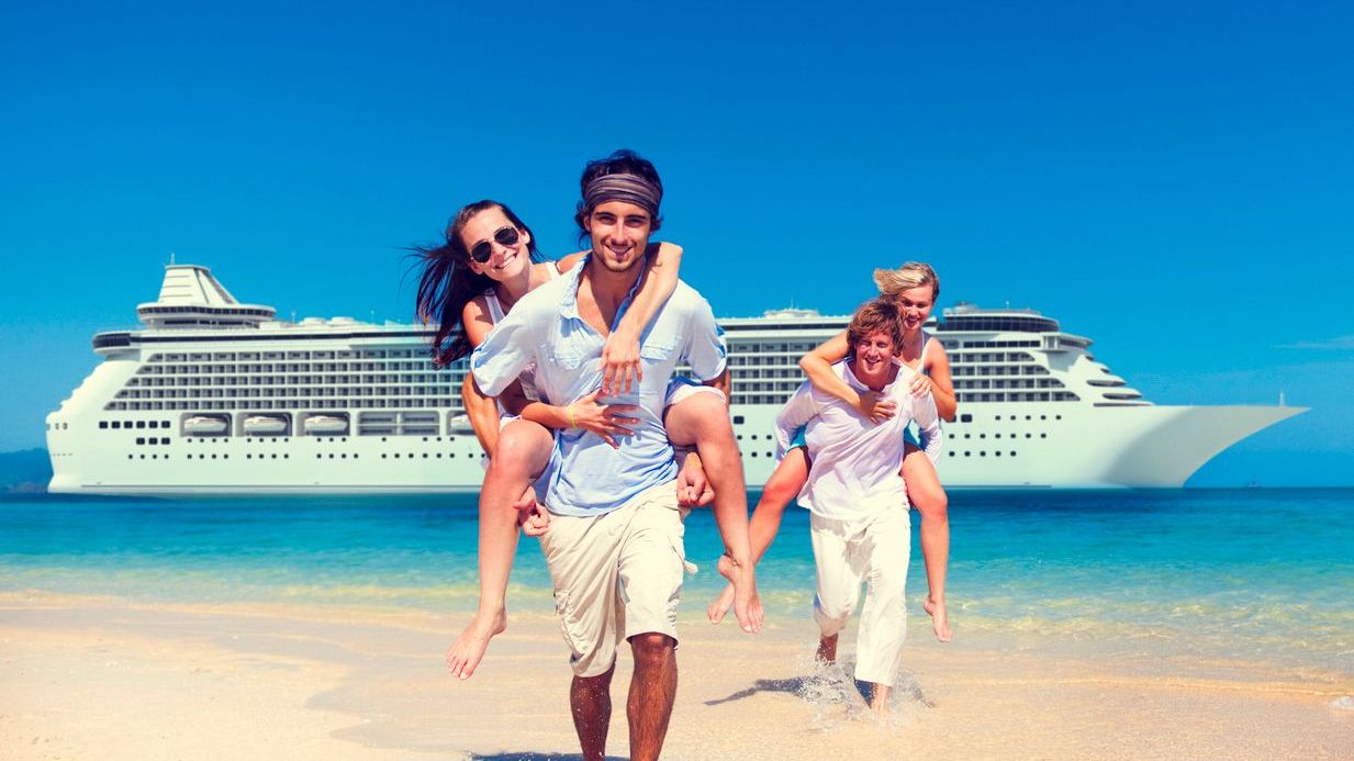 Stay Healthy on Your Cruise People smiling in front of a cruise ship