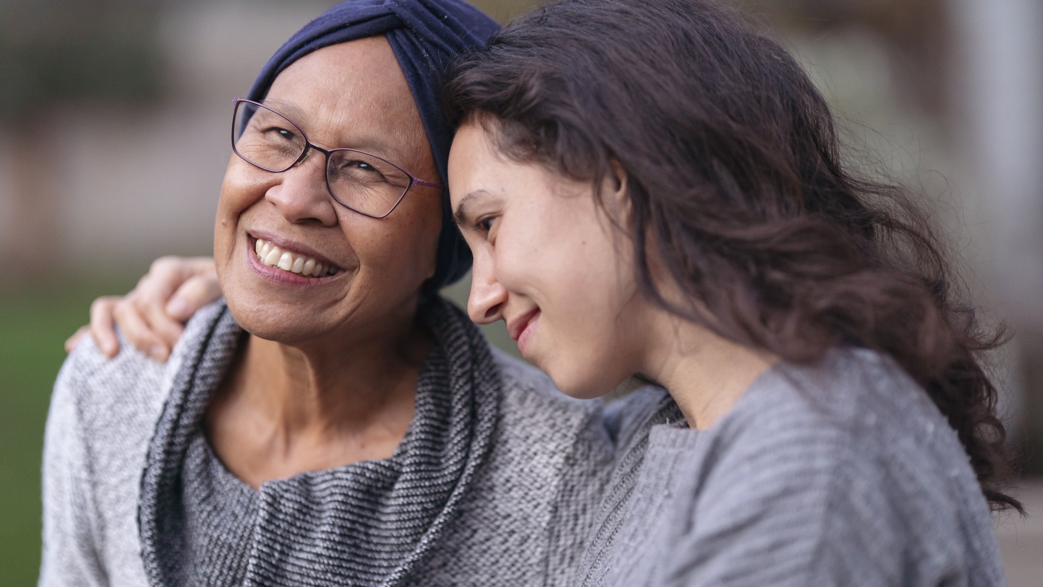 Mom and daughter healthy vision An older adult mom and her daughter embrace