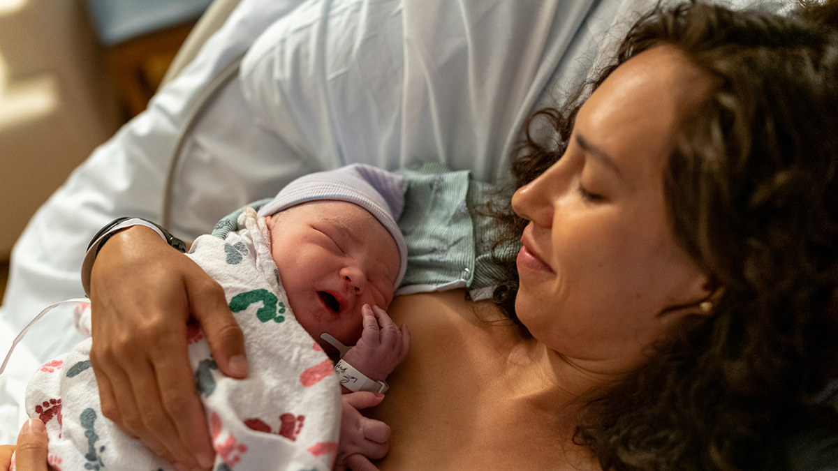Mother and her newborn baby A mother enjoying skin-to-skin bonding with her newborn baby