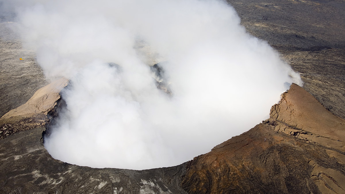 volcano ash Cloud of ash rising from an active volcano.