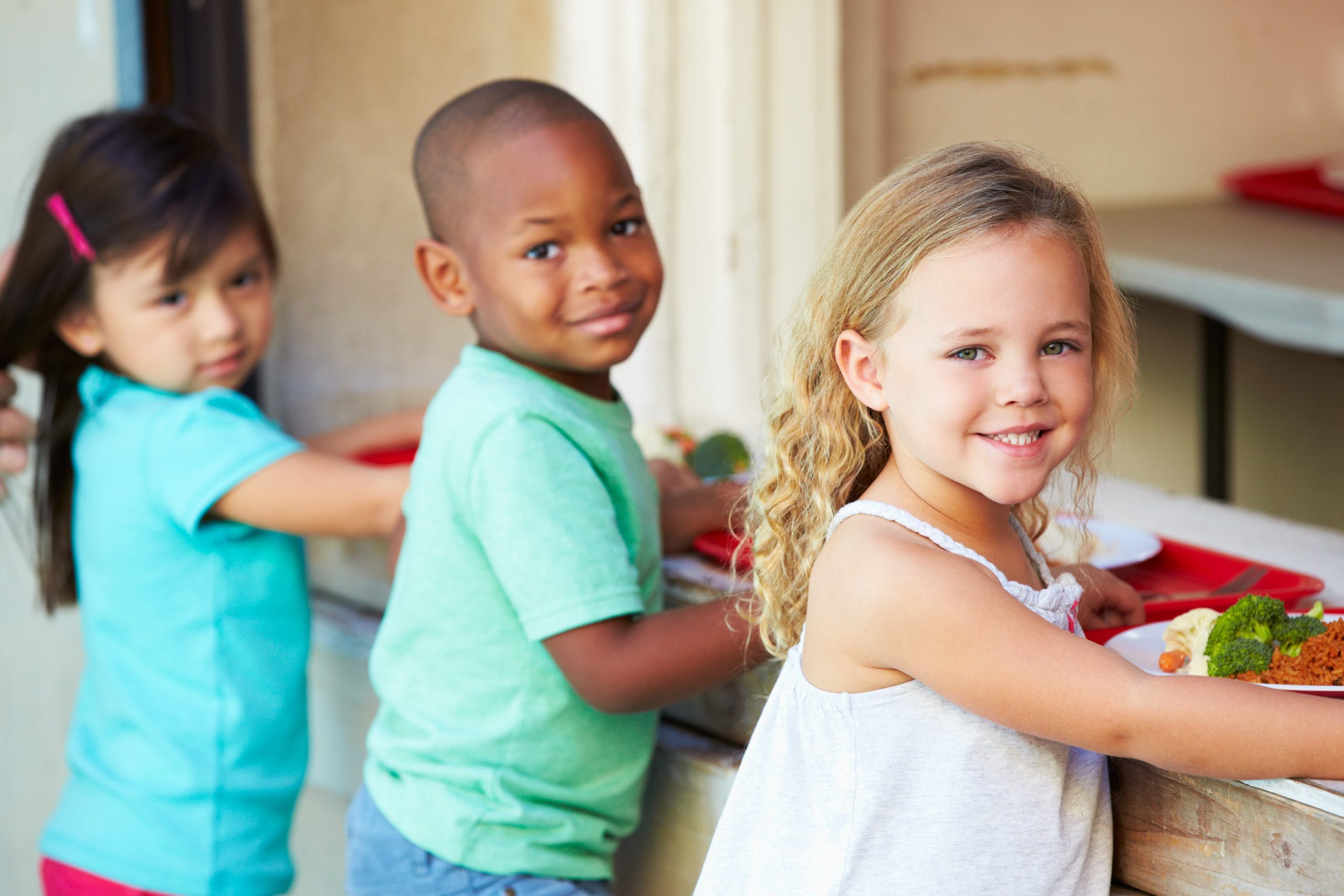 Elementary students collecting healthy school meals. Elementary students collecting healthy school meals.