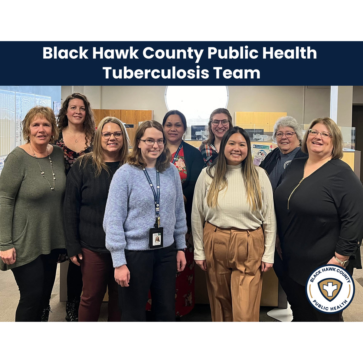 Black Hawk County Health Department 9 women from the TB Team at Black Hawk County Public Health Department standing and smiling