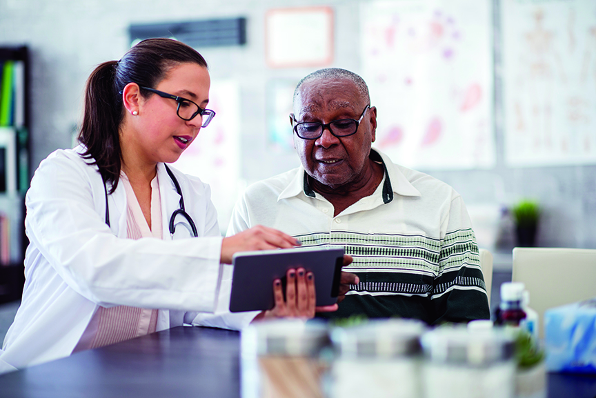 Photo of a doctor talking with a patient