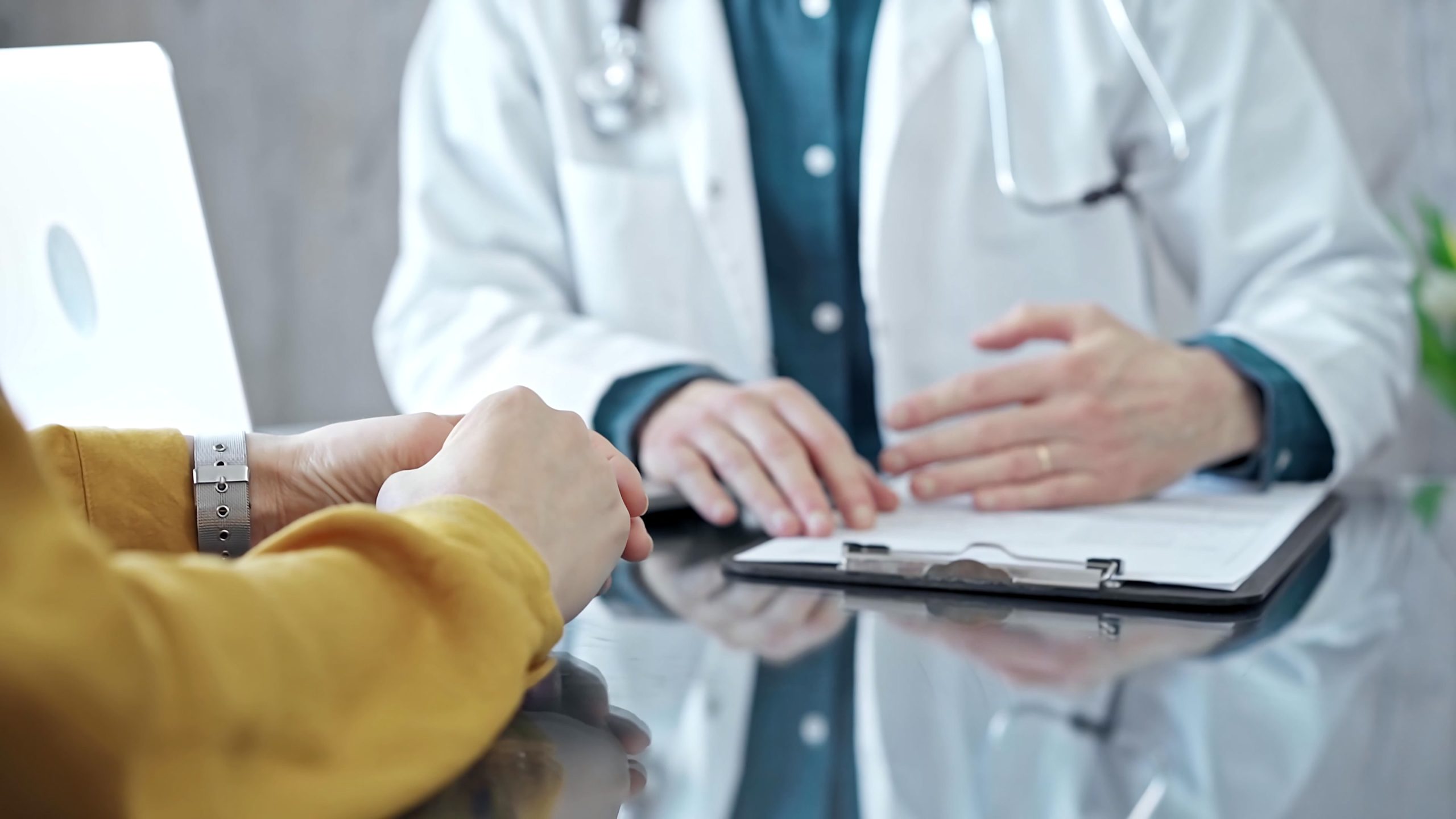 Healthcare professional talking to a traveler.