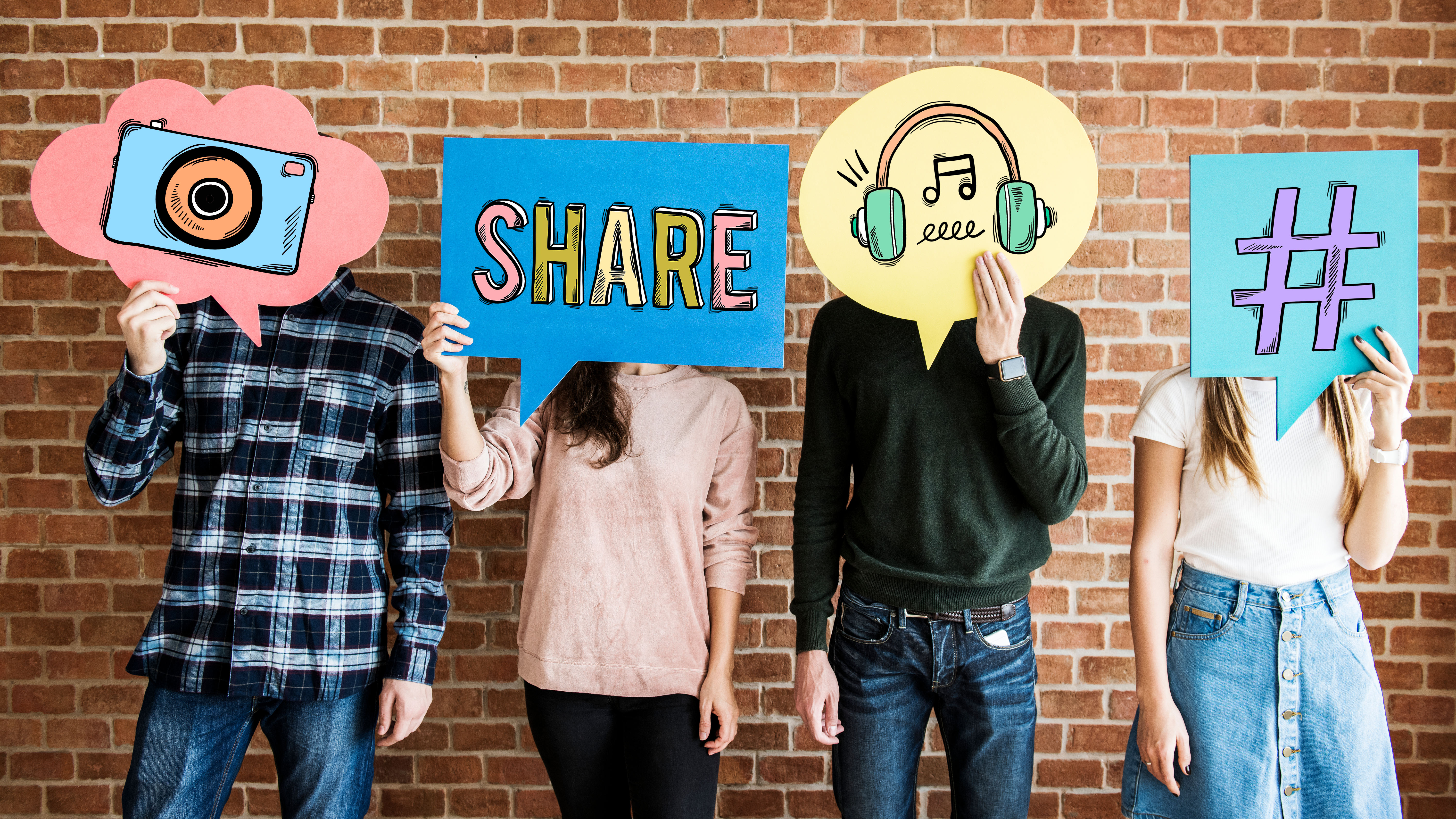 Four teens holding images in front of their faces, with each image representing a type of communication.